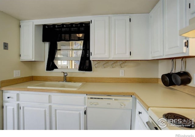 400 Emery St Unit 208, Longmont, CO 80501 - kitchen featuring dishwasher, a sink, white cabinets, and light countertops