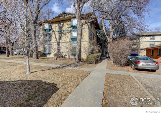 400 Emery St Unit 208, Longmont, CO 80501 - view of front of home with stucco siding