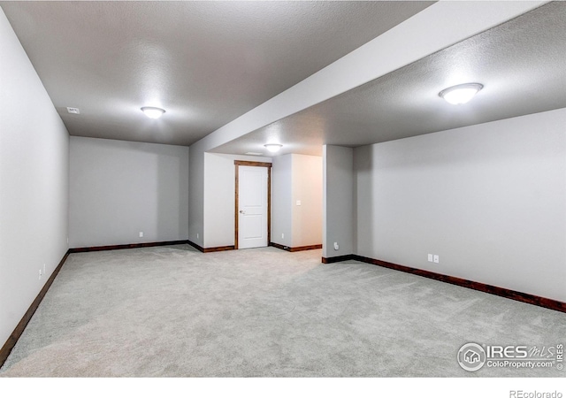 3570 Saguaro Dr, Loveland, CO 80537 - finished below grade area featuring carpet flooring, a textured ceiling, and baseboards