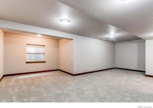3570 Saguaro Dr, Loveland, CO 80537 - unfurnished room featuring carpet flooring, baseboards, and a textured ceiling