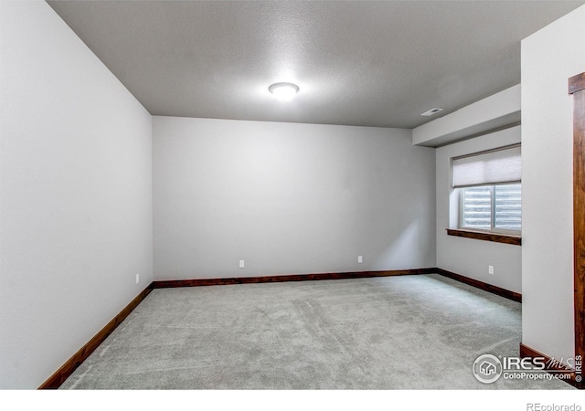 3570 Saguaro Dr, Loveland, CO 80537 - unfurnished room featuring carpet, baseboards, and a textured ceiling