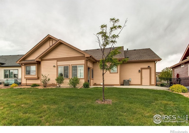 3570 Saguaro Dr, Loveland, CO 80537 - ranch-style house featuring central AC unit and a shingled roof