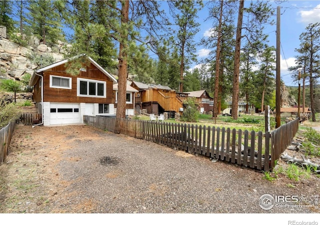 2459 W US Highway 34, Drake, CO 80515 - view of front of property featuring dirt driveway and a garage