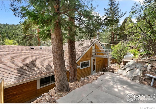 2459 W US Highway 34, Drake, CO 80515 - view of front facade featuring a patio and roof with shingles