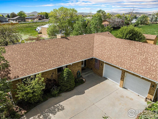 4601 N Sunshine Ct, Loveland, CO 80537 - aerial perspective of suburban area with a mountain backdrop