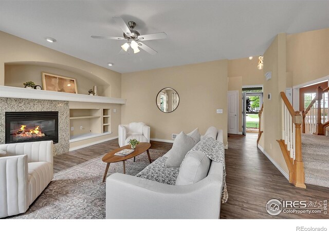 4764 Maggie Ct, Loveland, CO 80537 - living area featuring baseboards, wood finished floors, built in shelves, a ceiling fan, and recessed lighting