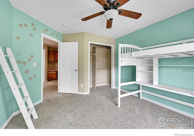 4764 Maggie Ct, Loveland, CO 80537 - unfurnished bedroom featuring carpet flooring, baseboards, a closet, and a ceiling fan