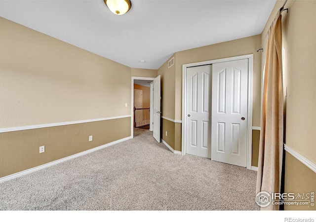 4764 Maggie Ct, Loveland, CO 80537 - unfurnished bedroom featuring carpet flooring, a closet, and baseboards
