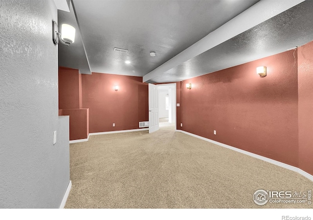 4764 Maggie Ct, Loveland, CO 80537 - empty room with a textured wall, carpet floors, and baseboards
