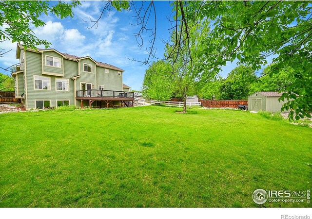 4764 Maggie Ct, Loveland, CO 80537 - view of yard with a wooden deck