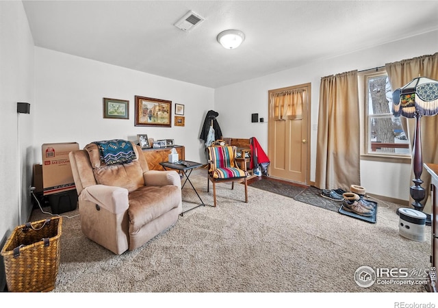 513 N 2nd Ave, Sterling, CO 80751 - living room featuring carpet floors