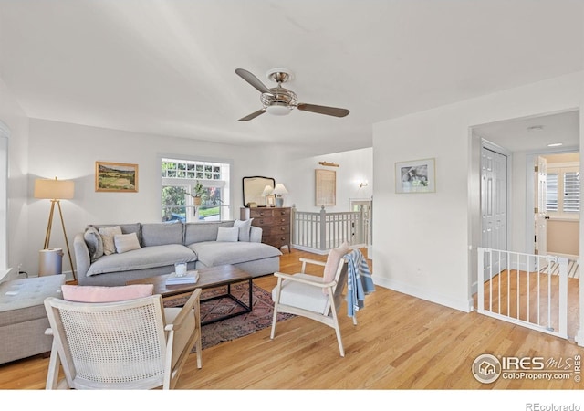 1133 Mapleton Ave, Boulder, CO 80304 - living room with light wood finished floors, ceiling fan, and baseboards