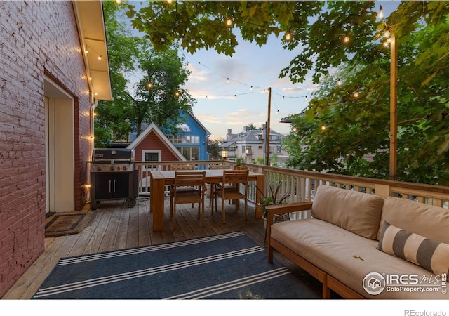 1133 Mapleton Ave, Boulder, CO 80304 - wooden deck featuring outdoor dining space, grilling area, and an outdoor living space