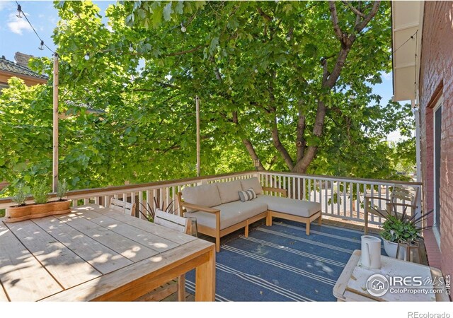 1133 Mapleton Ave, Boulder, CO 80304 - wooden deck featuring an outdoor living space