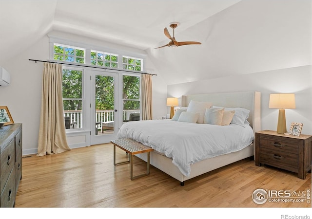 1133 Mapleton Ave, Boulder, CO 80304 - bedroom with vaulted ceiling, access to outside, light wood-style flooring, a ceiling fan, and a wall mounted AC