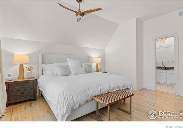 1133 Mapleton Ave, Boulder, CO 80304 - bedroom featuring light wood-type flooring, lofted ceiling, connected bathroom, a ceiling fan, and baseboards