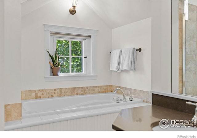 1133 Mapleton Ave, Boulder, CO 80304 - bathroom featuring lofted ceiling and a bath