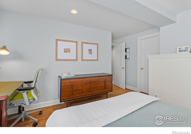 1133 Mapleton Ave, Boulder, CO 80304 - bedroom featuring baseboards, wood finished floors, an office area, and recessed lighting