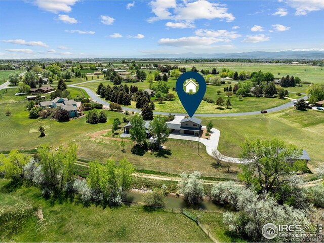 1119 Wrangler Way, Loveland, CO 80537 - overview of rural landscape featuring a mountain backdrop
