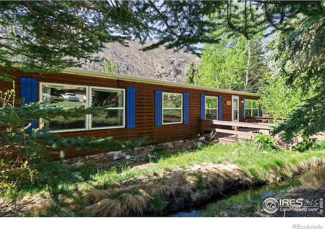 185 Meadow Ln, Bellvue, CO 80512 - view of front facade with a deck