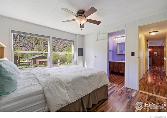 185 Meadow Ln, Bellvue, CO 80512 - bedroom featuring wood finished floors, connected bathroom, and a ceiling fan