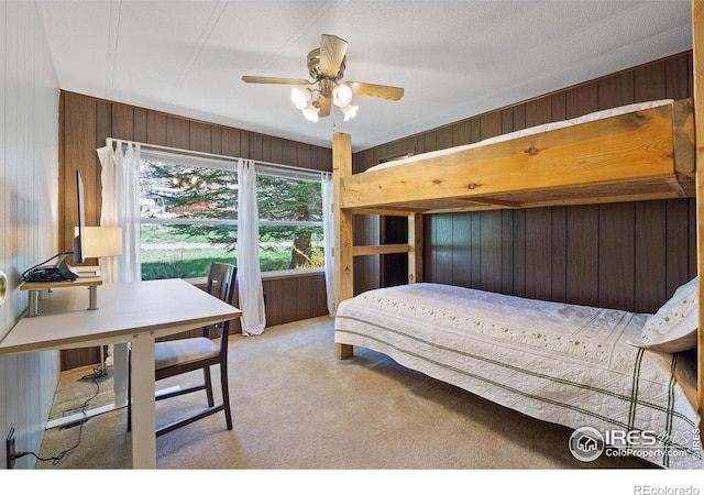 185 Meadow Ln, Bellvue, CO 80512 - carpeted bedroom featuring wooden walls