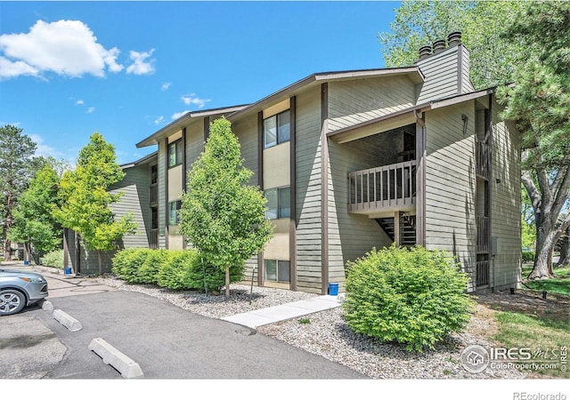 925 Columbia Rd Unit 714, Fort Collins, CO 80525 - view of building exterior featuring uncovered parking