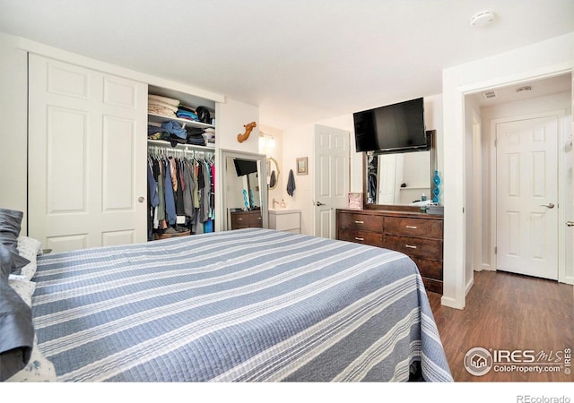 925 Columbia Rd Unit 714, Fort Collins, CO 80525 - bedroom featuring wood finished floors and a closet