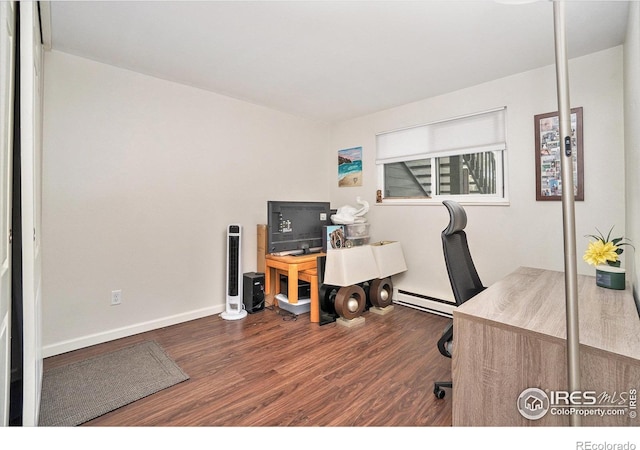 925 Columbia Rd Unit 714, Fort Collins, CO 80525 - office space featuring a baseboard heating unit, wood finished floors, and baseboards