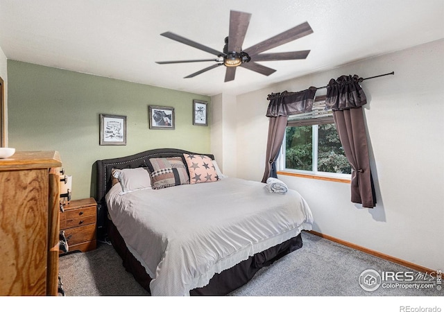 2325 42nd Avenue Ct, Greeley, CO 80634 - bedroom with carpet flooring, baseboards, and a ceiling fan