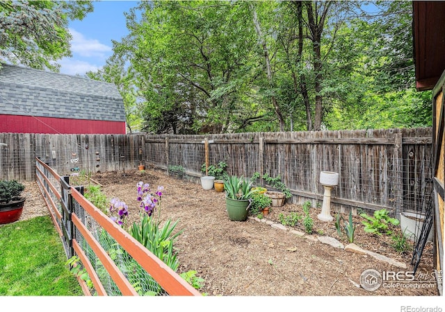 2325 42nd Avenue Ct, Greeley, CO 80634 - fenced backyard with a vegetable garden
