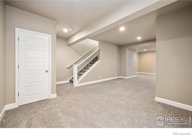 6071 Moran Rd, Timnath, CO 80547 - finished basement with carpet flooring, recessed lighting, stairs, and baseboards