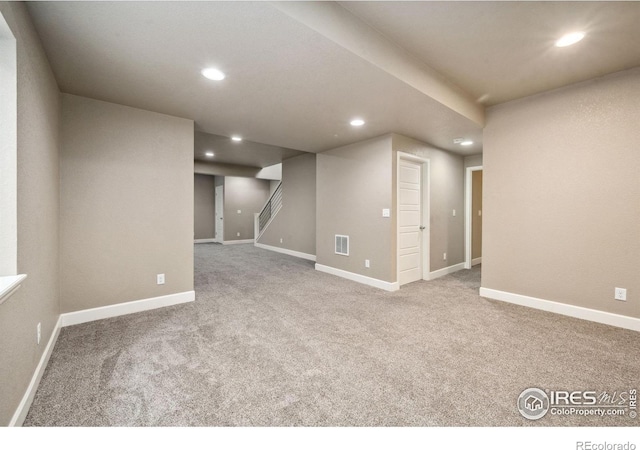 6071 Moran Rd, Timnath, CO 80547 - finished below grade area with recessed lighting, carpet flooring, stairs, and baseboards
