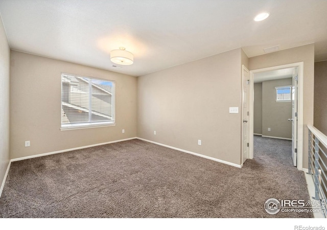 6071 Moran Rd, Timnath, CO 80547 - carpeted spare room with healthy amount of natural light, baseboards, and recessed lighting