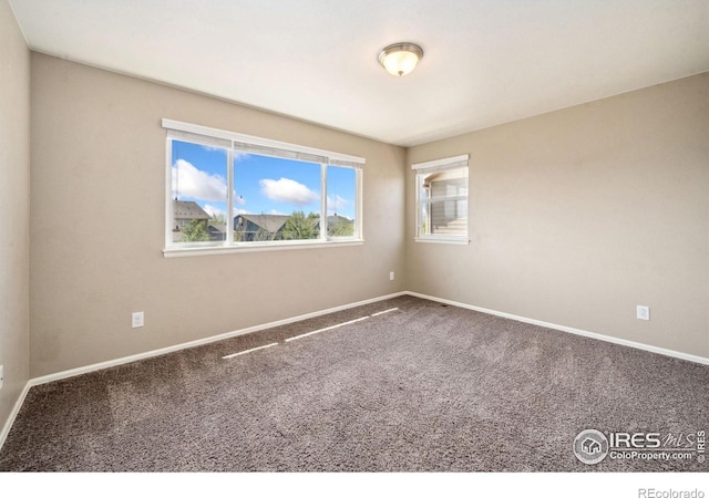 6071 Moran Rd, Timnath, CO 80547 - carpeted empty room featuring baseboards