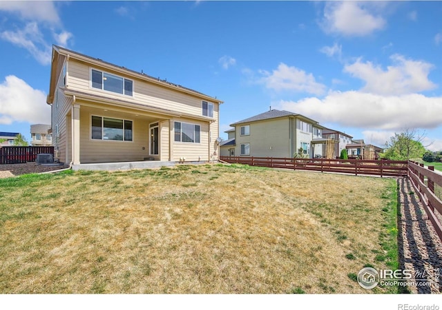 6071 Moran Rd, Timnath, CO 80547 - rear view of property featuring central AC unit