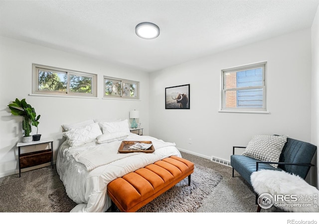 1832 24th Avenue Pl, Greeley, CO 80634 - carpeted bedroom featuring baseboards