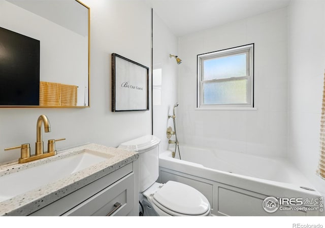 1832 24th Avenue Pl, Greeley, CO 80634 - bathroom featuring vanity, toilet, and bathtub / shower combination