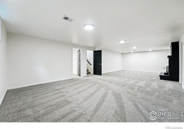 1832 24th Avenue Pl, Greeley, CO 80634 - finished basement featuring baseboards, carpet, and stairway