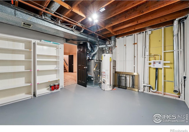 1832 24th Avenue Pl, Greeley, CO 80634 - unfinished basement featuring water heater, stairway, and heating unit