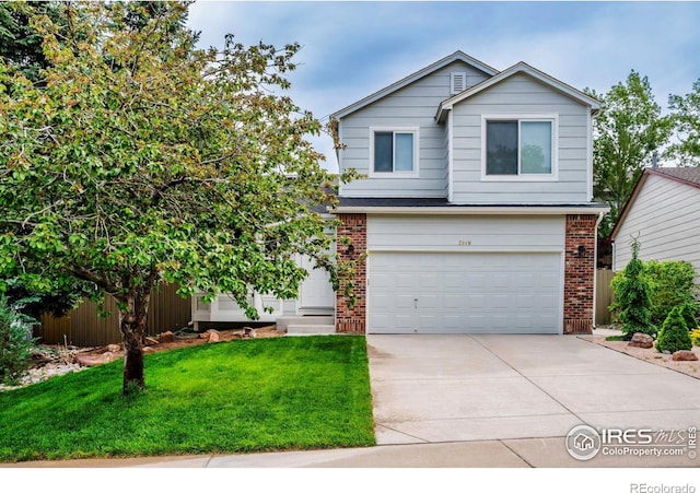 2940 E Yarrow Cir, Superior, CO 80027 - view of front facade with a garage, concrete driveway, brick siding, and a front yard