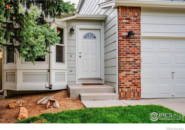 2940 E Yarrow Cir, Superior, CO 80027 - property entrance with brick siding and a garage