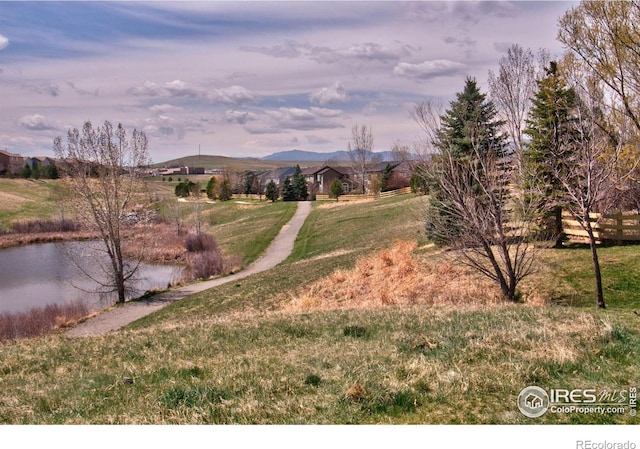 2940 E Yarrow Cir, Superior, CO 80027 - view of grassy yard with a water and mountain view
