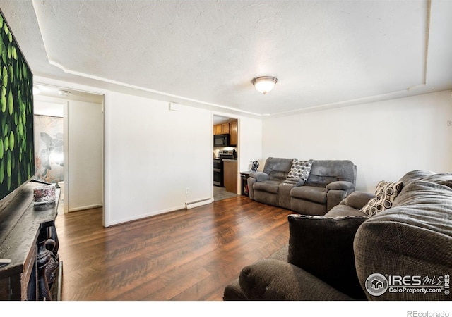 405 16th Ave, Greeley, CO 80631 - living area featuring wood finished floors and baseboards