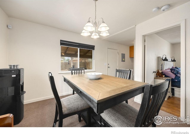 405 16th Ave, Greeley, CO 80631 - dining area with a chandelier and baseboards