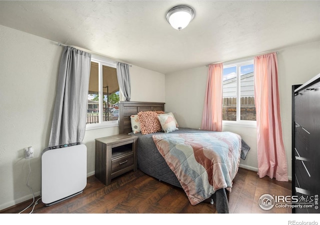 405 16th Ave, Greeley, CO 80631 - bedroom with multiple windows and baseboards