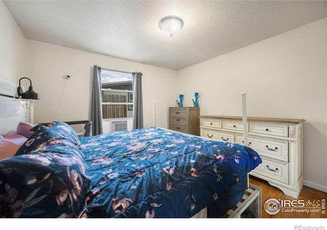 405 16th Ave, Greeley, CO 80631 - bedroom with wood finished floors and baseboards