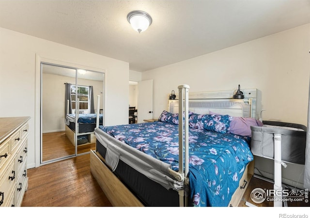 405 16th Ave, Greeley, CO 80631 - bedroom featuring dark wood-type flooring and a closet