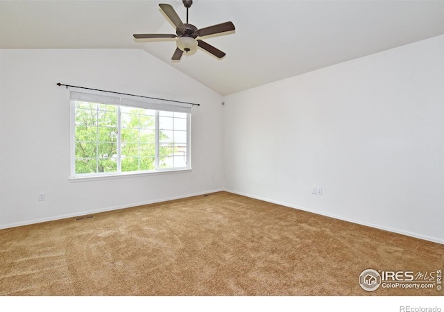 2334 75th Ave, Greeley, CO 80634 - empty room with carpet, a ceiling fan, vaulted ceiling, and baseboards