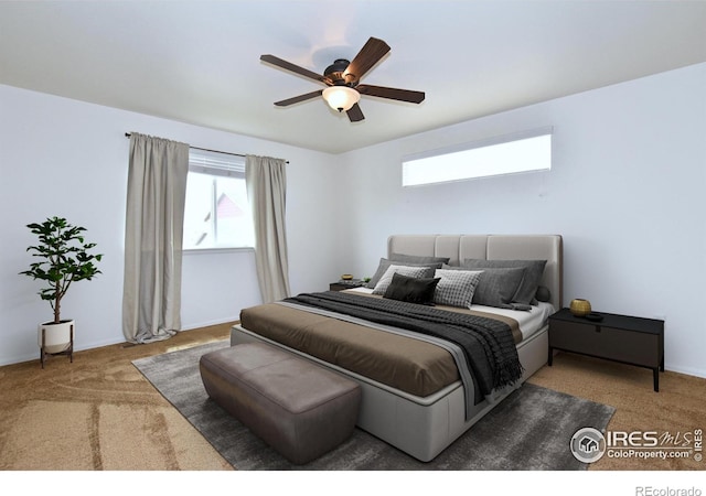 2334 75th Ave, Greeley, CO 80634 - carpeted bedroom featuring a ceiling fan and baseboards